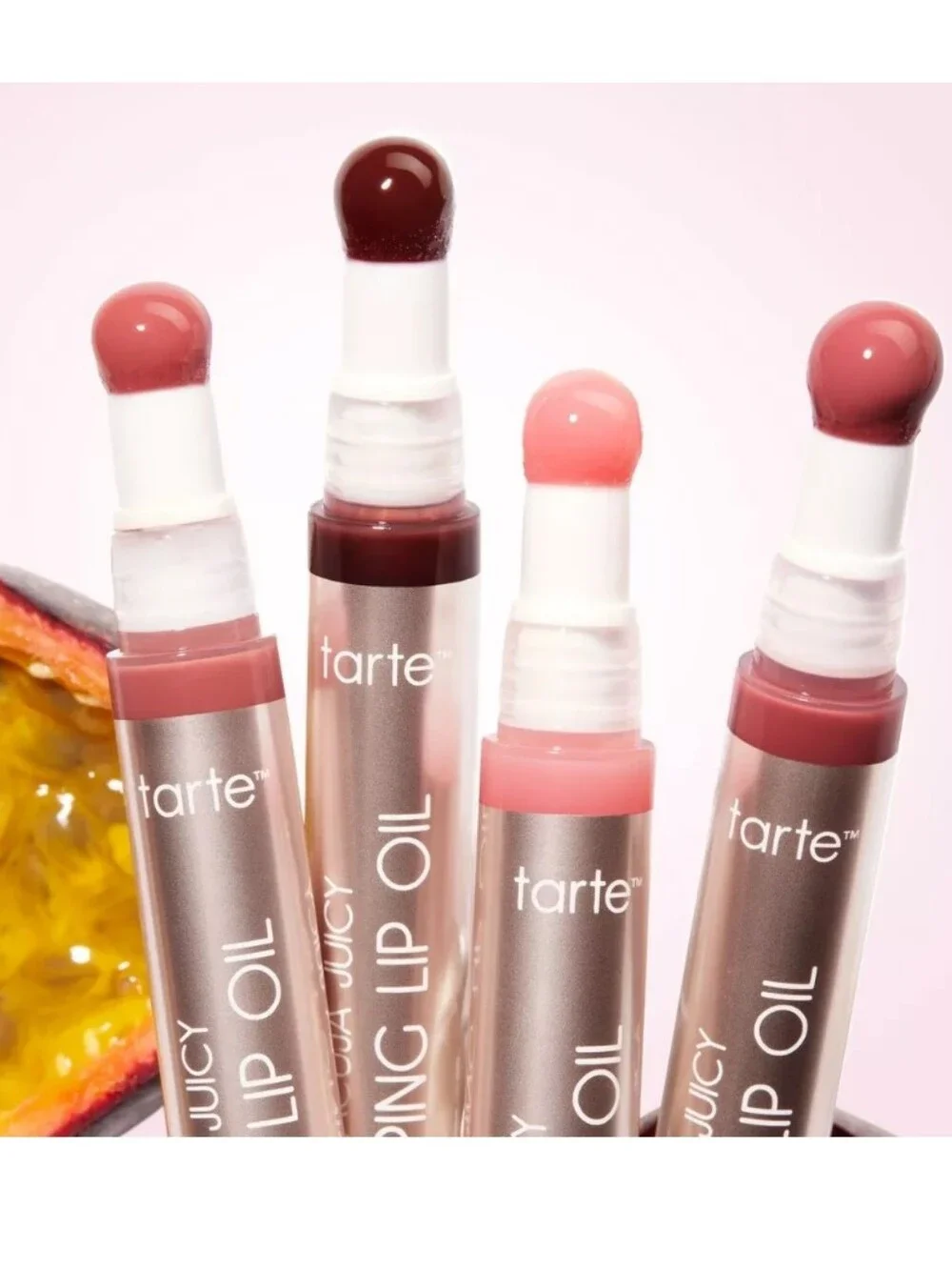 TARTE MARACUJA JUICY PLUMPING LIP OIL.
